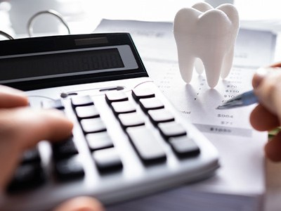 Patient in Fort Worth filling budgeting for a root canal