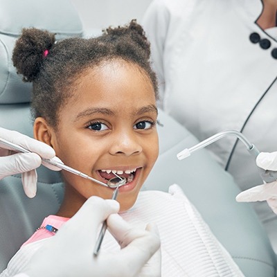 Child getting a teeth cleaning in Fort Worth