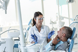 Dentist explaining treatment to patient